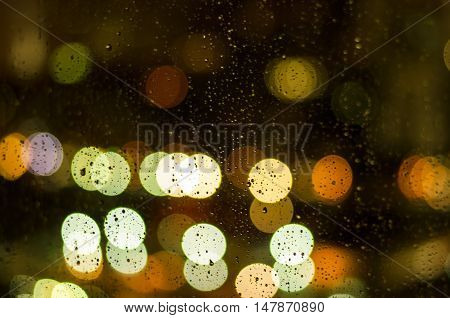 Rain running down a window, blurry focus