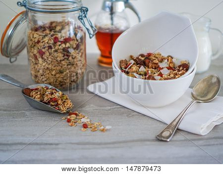 Healthy Coconut Granola with Nuts, Gogi Berry and Honey. Healthy breakfast. Selective focus.