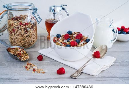 Healthy Coconut Granola with Nuts, Gogi Berry and Berries. Healthy breakfast. Selective focus.