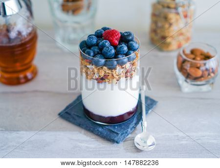 Healthy Yogurt Parfait and Granola with Nuts and Berries. Healthy breakfast. Selective focus.