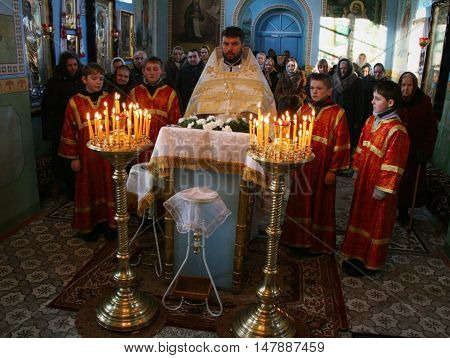 VOYUTYN UKRAINE - 08 JANUARY 2009: Orthodox priest during Christmas service