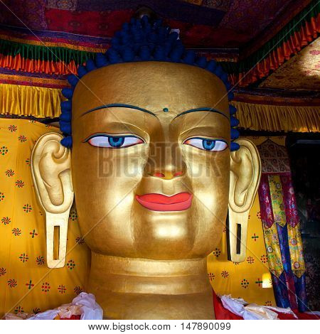LEH, INDIA - JUNY 11: Beautiful sculpture of Gautama Buddha at Shey Monastery on Juny 11 2013 in Leh, Ladakh, Jammu and Kashmir state. The main Shakyamuni Buddha statue in the monastery is a 12 metres (39 ft) icon covering three floors of the monastery.