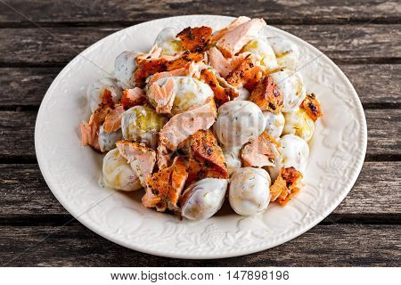 Salmon and young potato warm salad with a lemony yogurt dressing.
