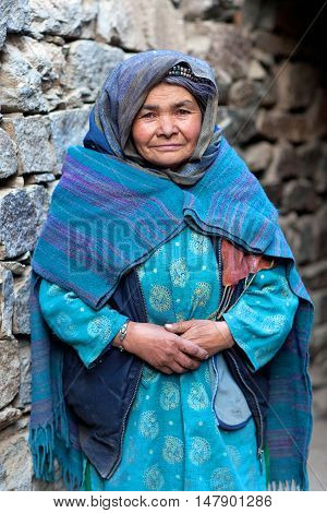 TURTUK, INDIA - JUNE 13, 2012: Woman from Baltistan poses for a photo in Turtuk village, Ladakh, Jammu and Kashmir State, North India