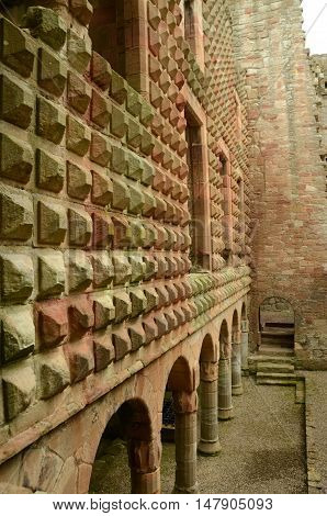 A view along the diamond faceted façade in Crichton castle