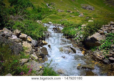 Alpien stream with rocks in Gran Paradiso National Park, Valle Aosta, Italy