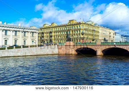 SAINT PETERSBURG RUSSIA - APRIL 25 2015: The Anichkov Bridge is one of the most beautiful sites in city connecting banks of Fontanka River on April 25 in Saint Petersburg.