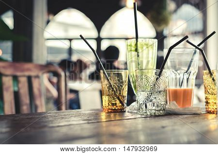 Empty vintage glass of a lot of drink after party