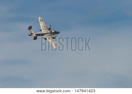 NEW WINDSOR NY - SEPTEMBER 03 2016: Panchito is a North American B-25 Mitchell from the Word War II Era flying over Stewart Airport at the New York Airshow
