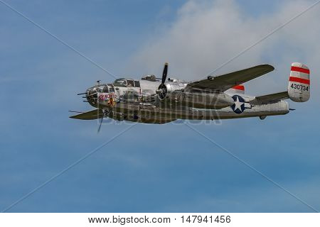 NEW WINDSOR NY - SEPTEMBER 03 2016: Panchito is a North American B-25 Mitchell from the Word War II Era flying over Stewart Airport at the New York Airshow