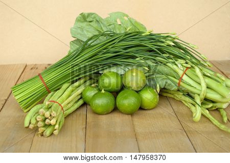 green Lime Yardlong bean Leek and kale on wood floor