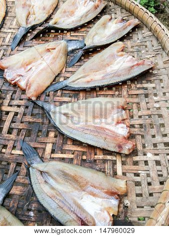 close up dry striped snakehead fish raw food