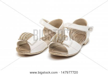 old baby shoes isolated on white background