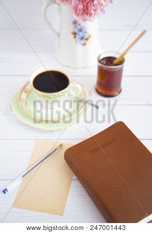 Morning Breakfast And A Bible Study On A White Table