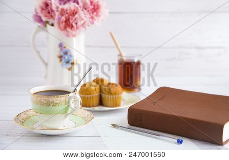 Morning Breakfast And A Bible Study On A White Table