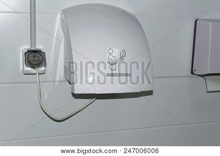 Modern Vertical Hand Dryer In Public Restroom Wc