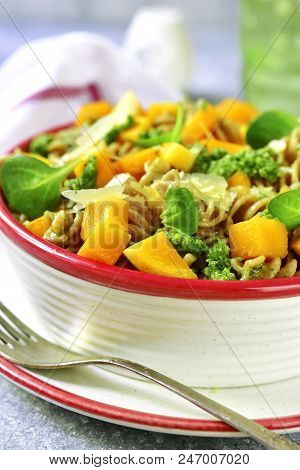 Whole Grain Fusilli Pasta With Pumpkin And Pesto Sauce.