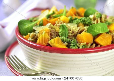 Whole Grain Fusilli Pasta With Pumpkin And Pesto Sauce.