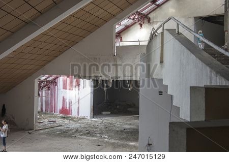 Tirana, Albania - 16 July 2017 : Lonely Tourists View The Ramshackle Interior  Of The Pyramid Of Tir
