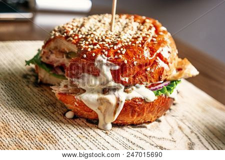 Fast Food Burger Bitten Off With Mayonnaise Flow Out