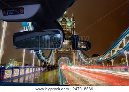 Looking Through A Dashcam Car Camera Installed On A Windshield With View Of Tower Bridge At Night, I