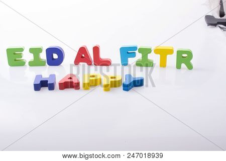 The Word Eid El Fitr  Written With Colorful Letter Blocks