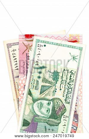 Heap Of Omani Rial Bank Notes With Copy Space