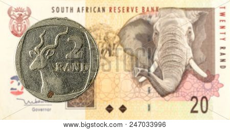 2 South African Rand Coin Against 20 South African Rand Banknote