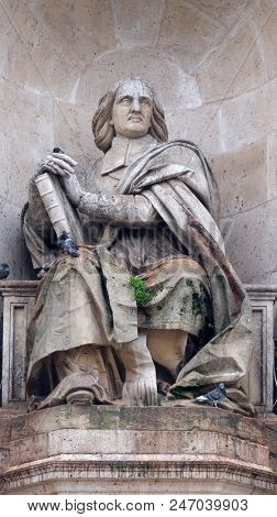 PARIS, FRANCE - JANUARY 04: Bossuet by Jean Jacques Feuchere, Fountain of the Sacred Orators, Place Saint Sulpice in Paris, France on January 04, 2018.