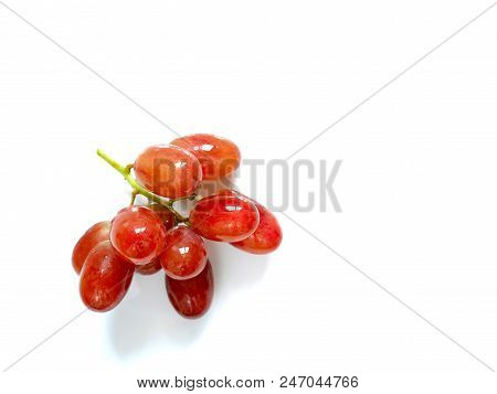 Fresh Red Seedless Grapes Isolated On White Background With Copy Space