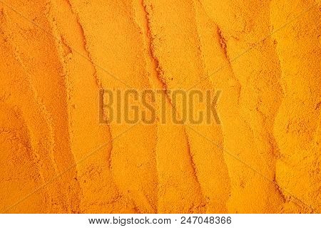 Turmeric Powder Texture Nature For Background. Herbal