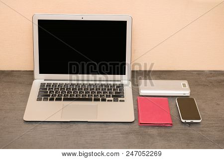 Laptop, Smartp Hone And Notepad. Work Place.