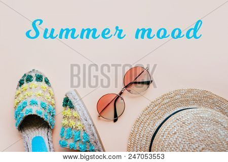 Summer Fashion Flatlay With Espadrille Sandals, Gradient Round Sunglasses And Straw Hat On The Beige