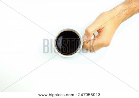 Cup Of Coffe In Hand On The Clear, White Background