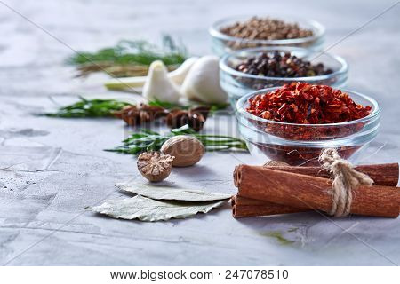 Three Glass Bowls With Spices Arranged In Rows On White Textured Background, View From Above, Select