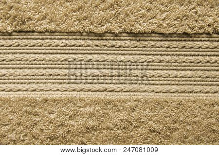 Element Of Beige Bathtowel. Fleecy Decorative Element With Braided Pigtails. Bathroom Accessories Ba