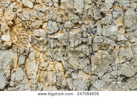 Textured Stone Background Rubble Ballast In Natural Form In The Rock Wall.
