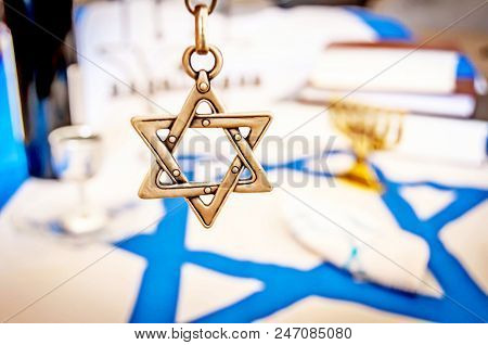 Hand Holding A David Star (
