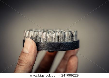 Object Printed On Metal 3d Printer. Dental Crowns Created In A Laser Sintering Machine Close-up. Dml