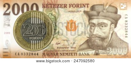 200 Hungarian Forint Coin Against 2000 Hungarian Forint Bank Note Obverse