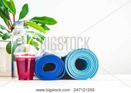 Set For Sports, A Yoga Mat, A Towel, Smoothies , Bottle Of Water The Concept Of A Healthy Lifestyle 