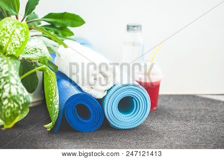 Set For Sports, A Yoga Mat, A Towel, Smoothies , Bottle Of Water The Concept Of A Healthy Lifestyle 