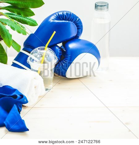 Set For Sports, A Yoga Mat, A Towel, Boxing Gloves And A Bottle Of Water On A Light Background. The 