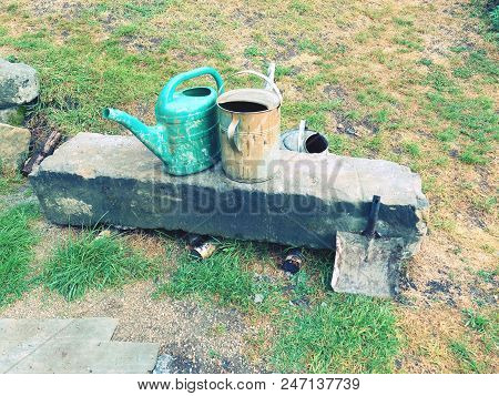 Autentic And Decorative Building Stones In Pile. Old Heavy Sandstone Blocks Rest After Rebuilding.