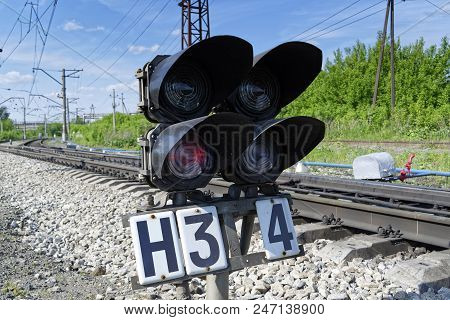 Semaphore On The Railway Crossing Burns Red