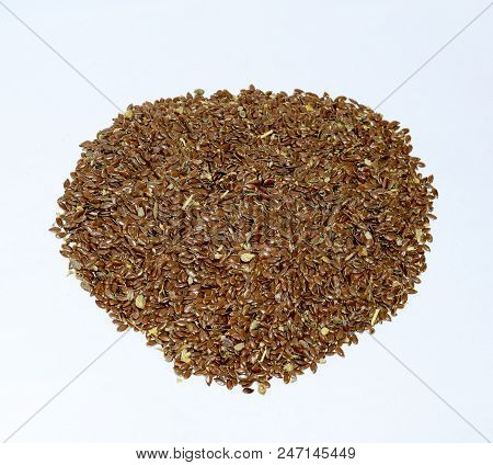 Flax Seeds. Storage Of Flax Seeds. Flax, Essential Oil Culture. A Handful Of Flax Seeds.