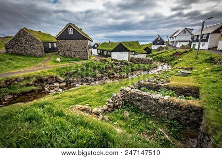 house with green roof in mykines faroe islands