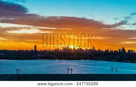 A Scenic Sunrise View Of Manhattan As Seen From Jersey City.