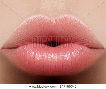 Closeup Kiss Natural Lip Makeup. Beautiful Plump Full Lips On Female Face. Clean Skin, Fresh Make-up