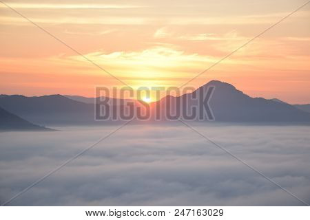 Sunrise On Mist And Mountain In Thailand